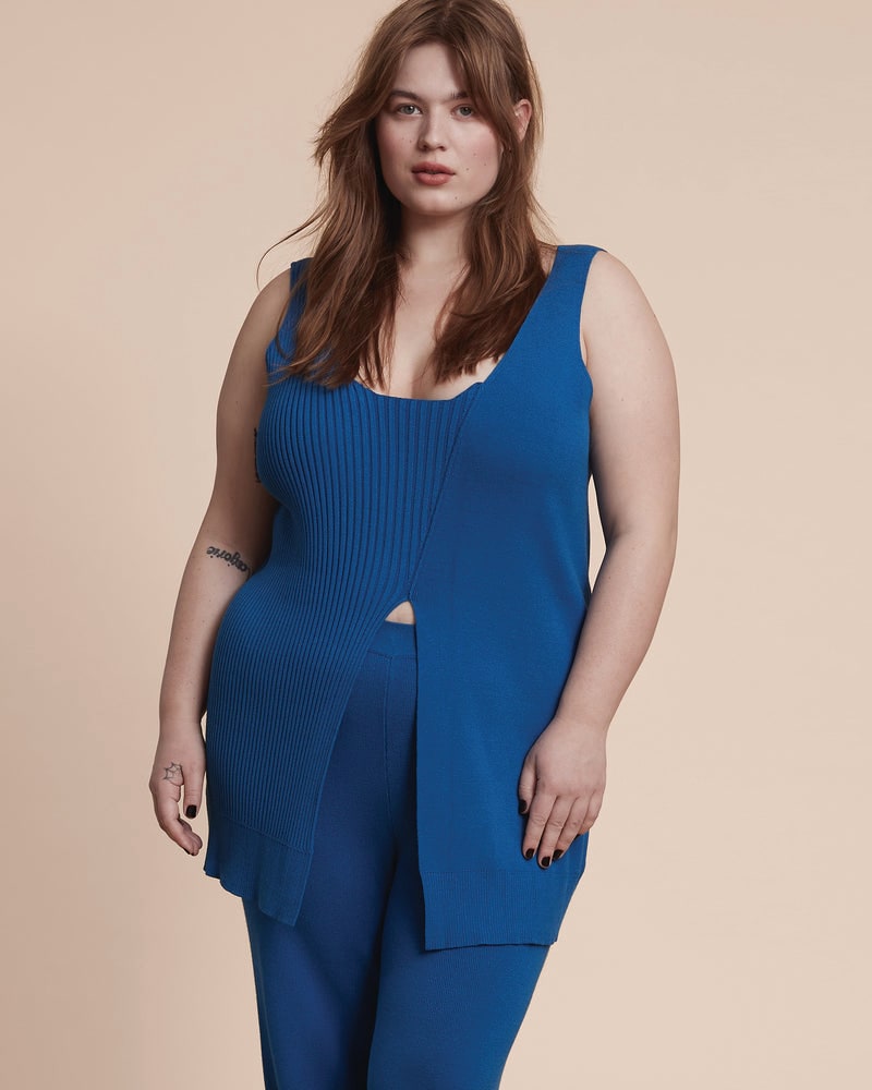 Front of a model wearing a plus size Christina Sweater Tunic Tank in Cerulean Blue by 11 Honoré Collection. | dia_product_style_image_id:231039